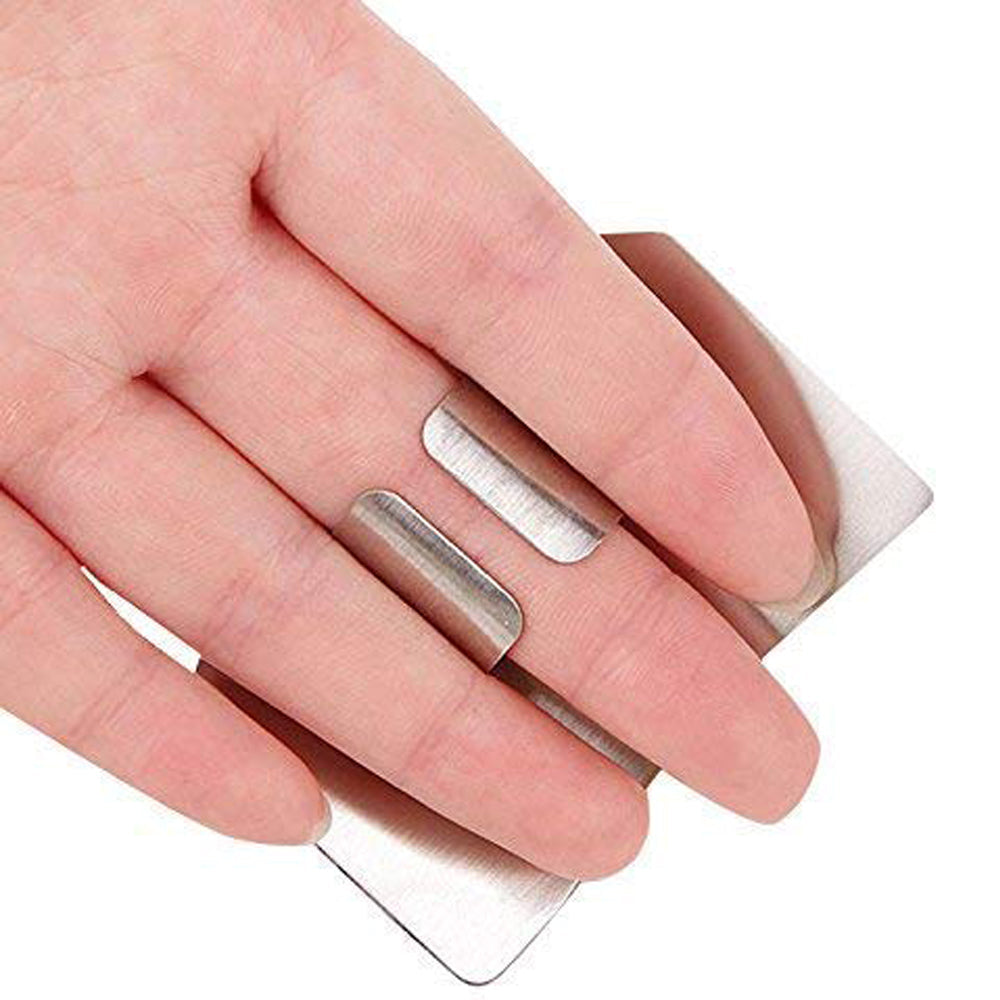Kitchen finger guard made of stainless steel for safe chopping. Kitchen finger guard made of stainless steel for safe chopping.